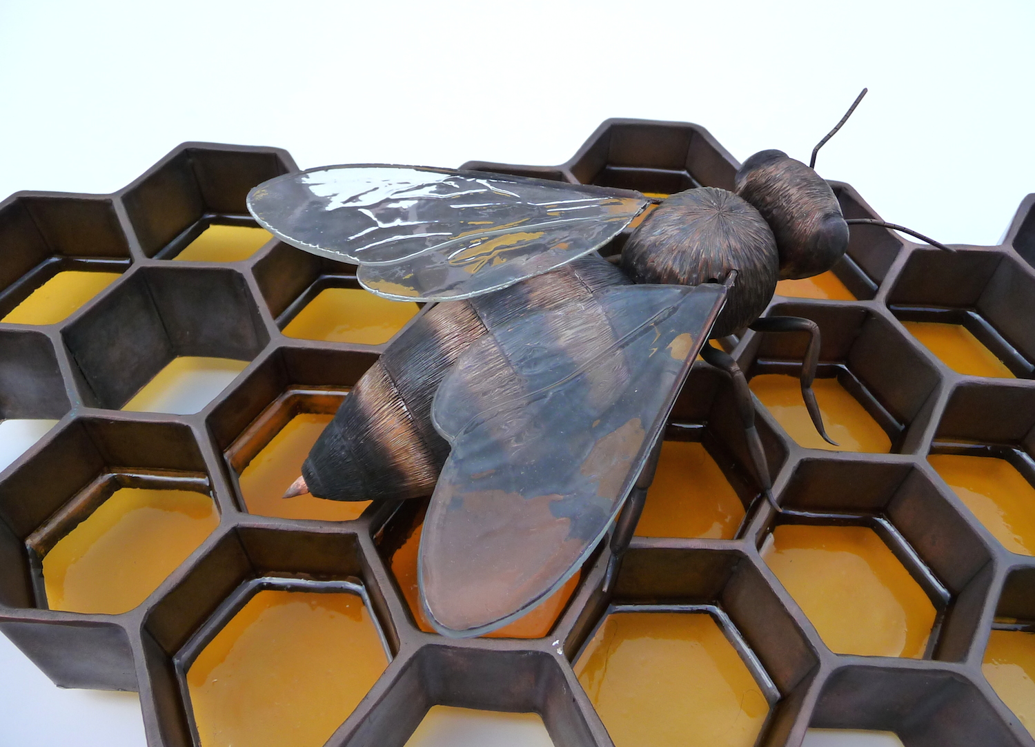 copper metal honey bee sculpture